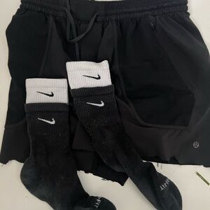 Lulu lemon shorts size medium and white and black Nike socks